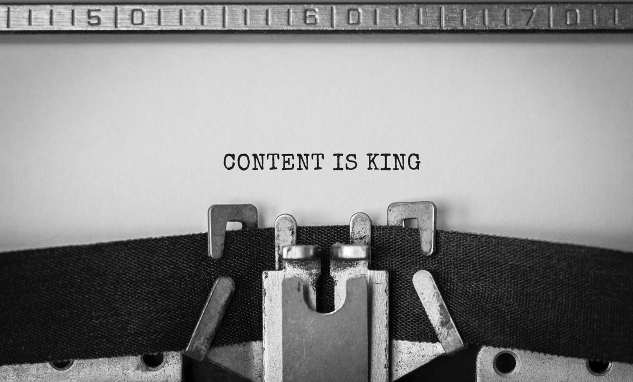 Text Content is King typed on retro typewriter